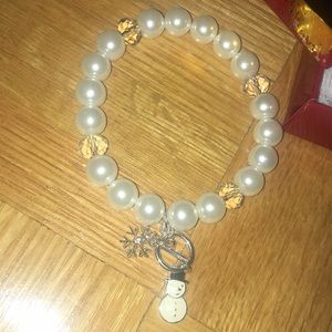 Bracelet with a mini snow man